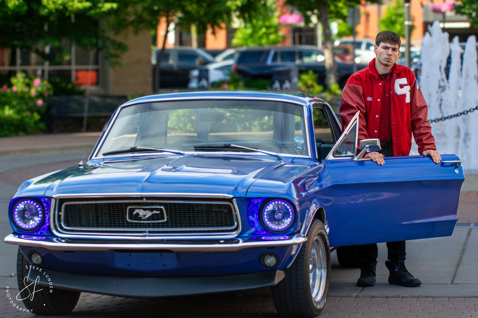Anoka senior pictures of Shane on historic Main Street in downtown Anoka